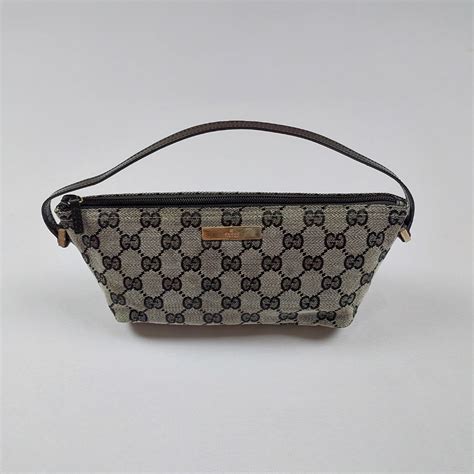 pochette gucci monogram prezzo|GUCCI Monogram Boat Pochette Black 1524964.